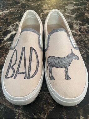 Casual Pink Canvas Slip-On Sneakers with 'BAD' Donkey Graphic